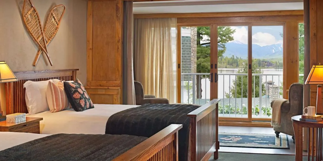 Two queen size beds with view of the lake