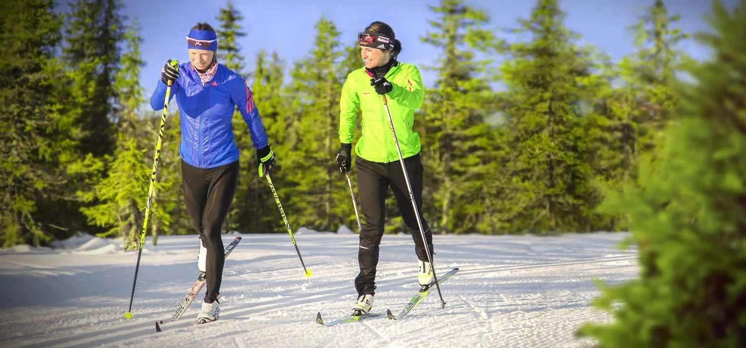 Two women skiing