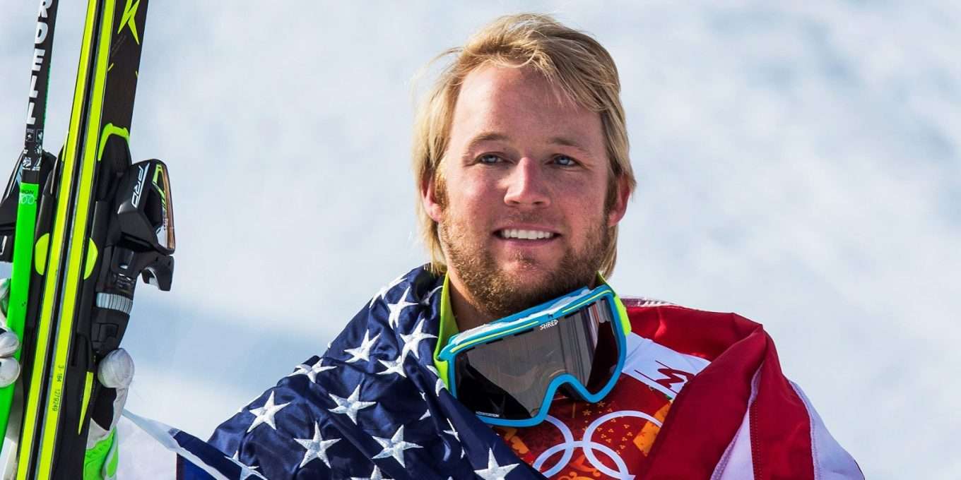 Andrew Weibrecht with flag