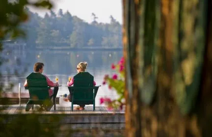 Couple sitting on the dock