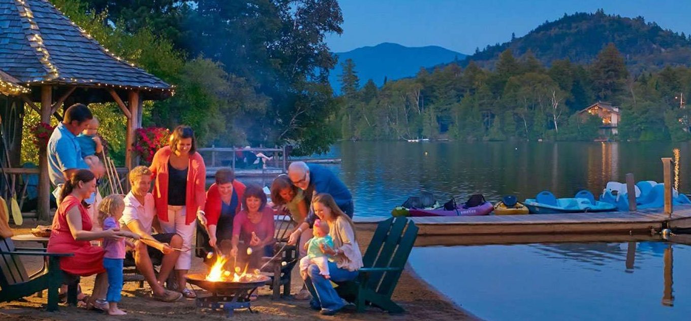 Family having smores on the beach