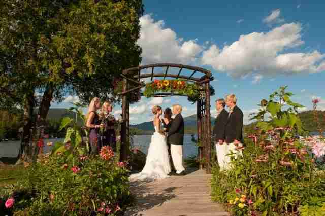 Outdoor wedding in front of lake