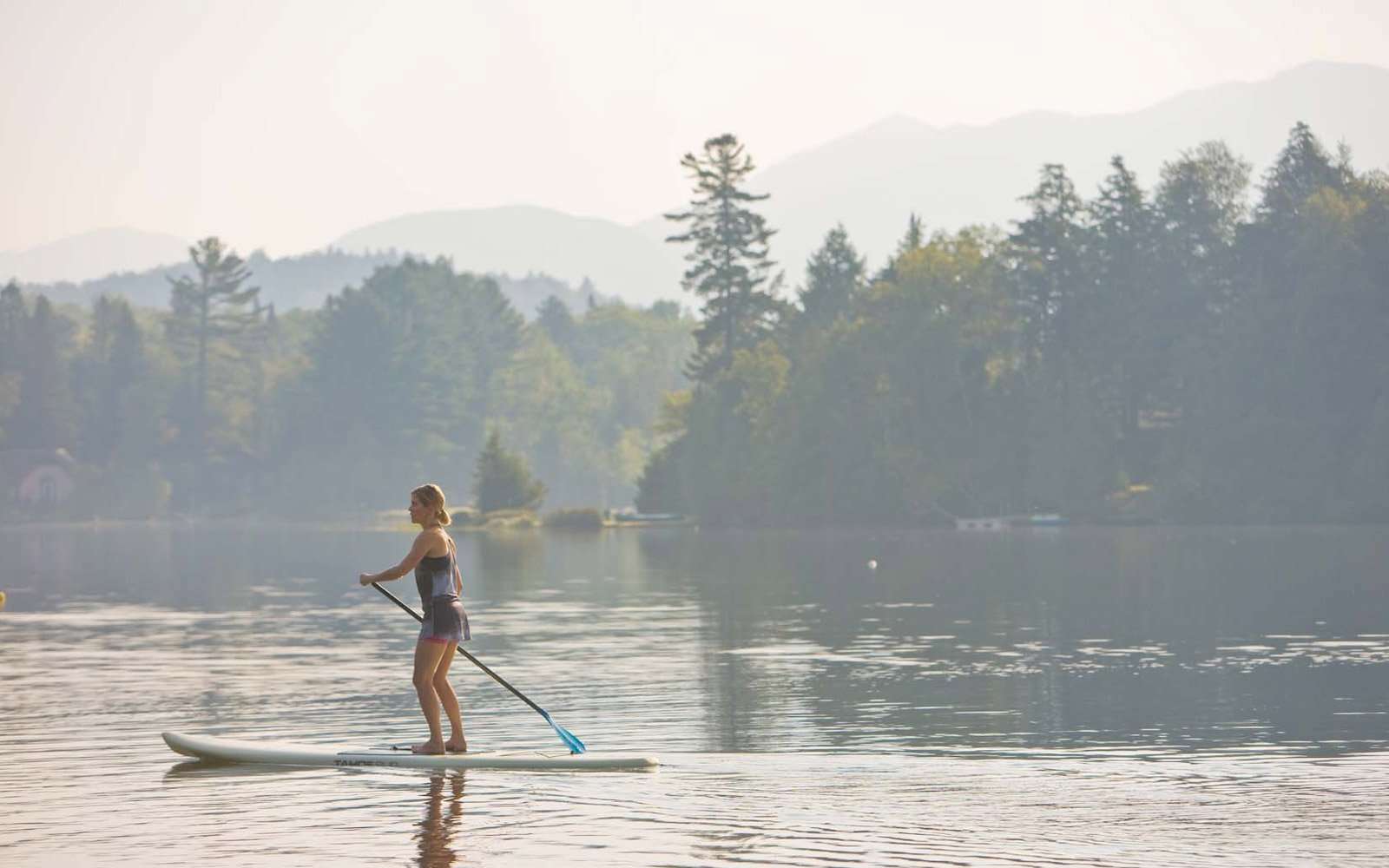 Woman on a stand-up paddleboard
