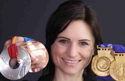 Athlete holding medals
