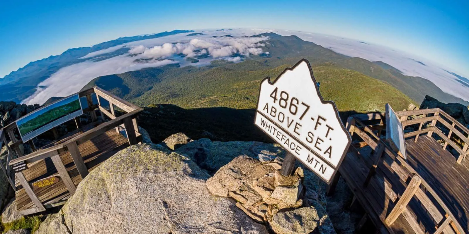 Aerial view of Whiteface Mountain summit signage which reads 4867 Ft above sea