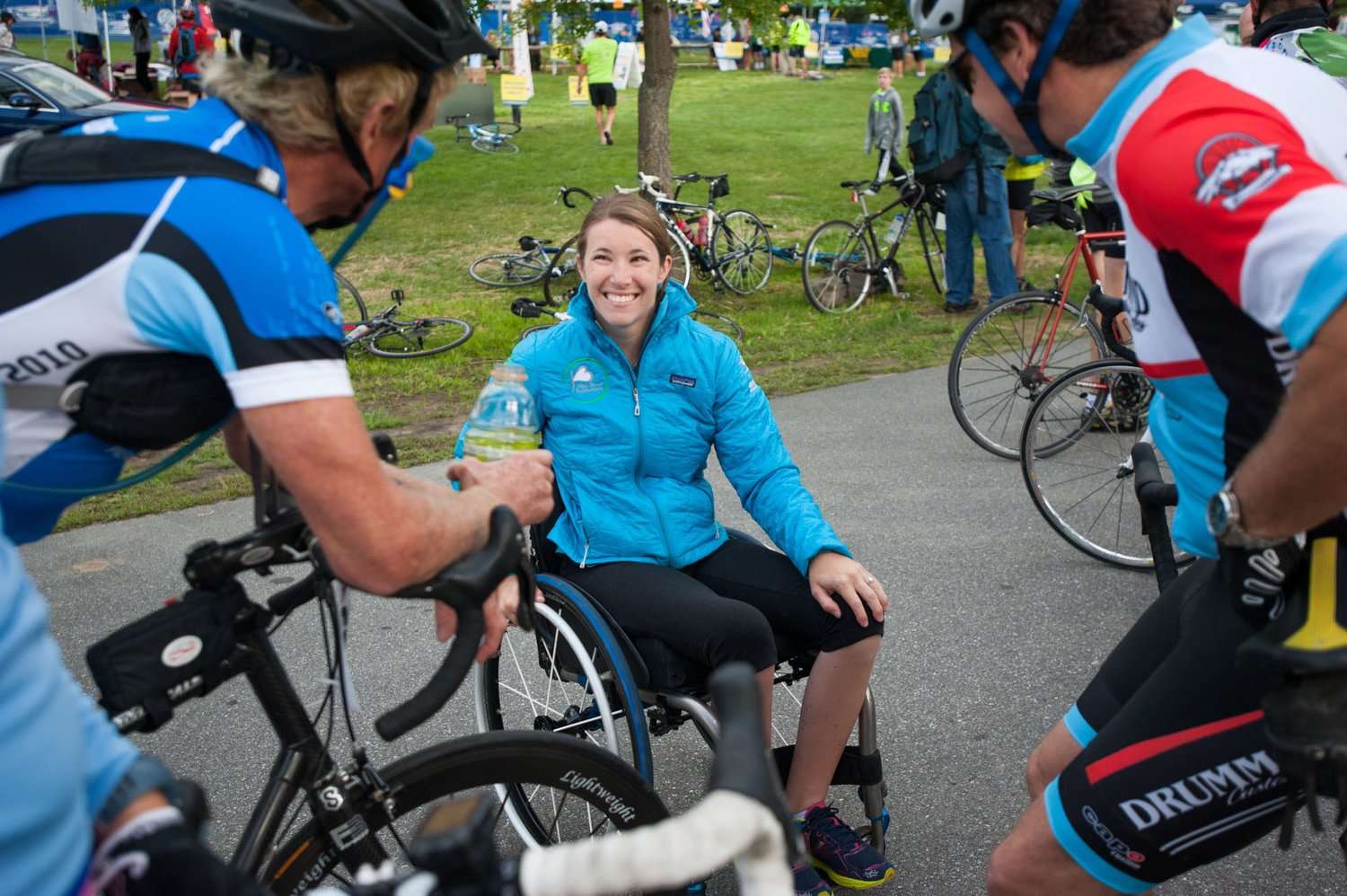 Kelly Brush (middle, seated) continues to raise money for physically challenged athletes