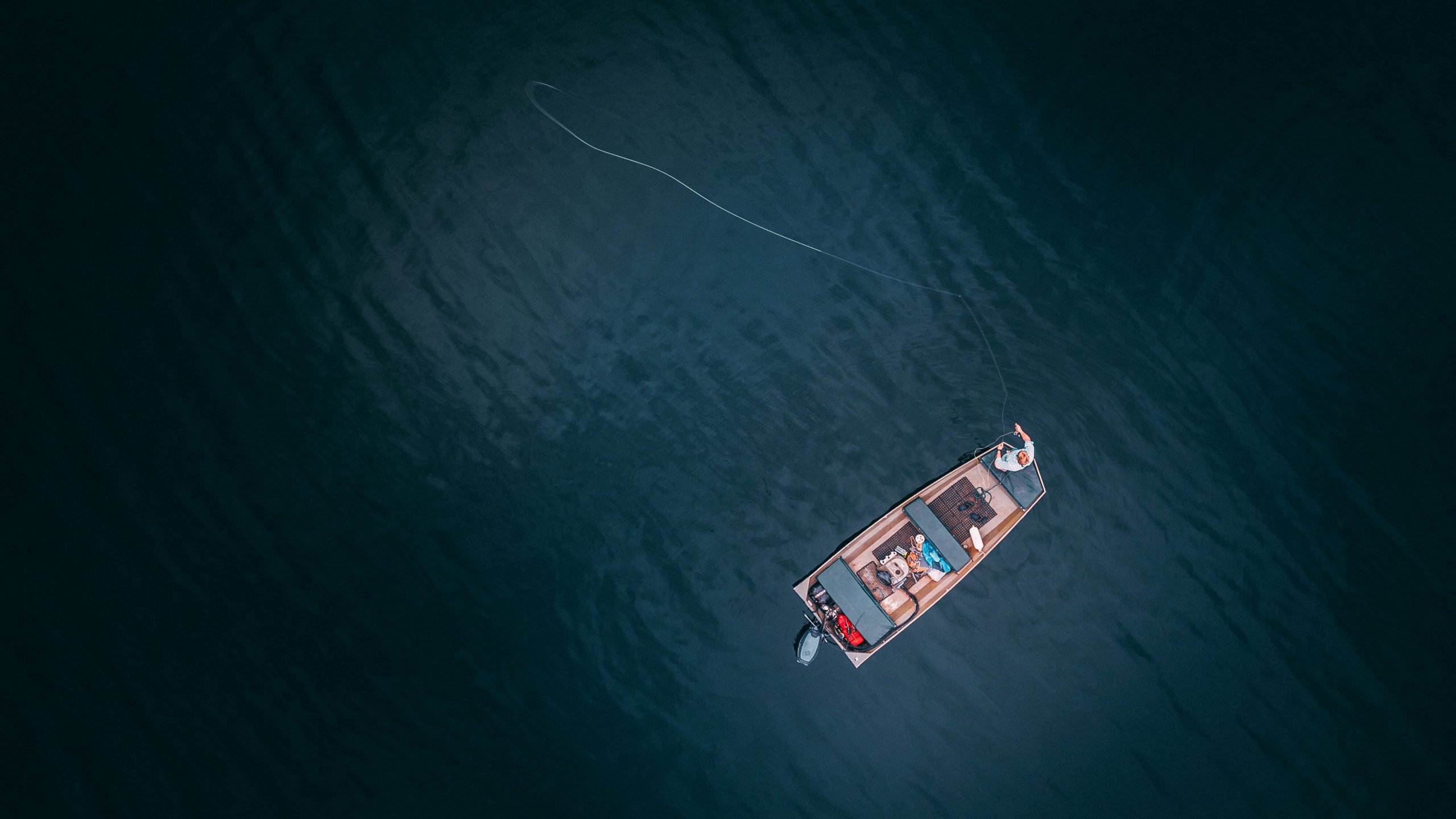 Aerial photo of a fishing boat in water