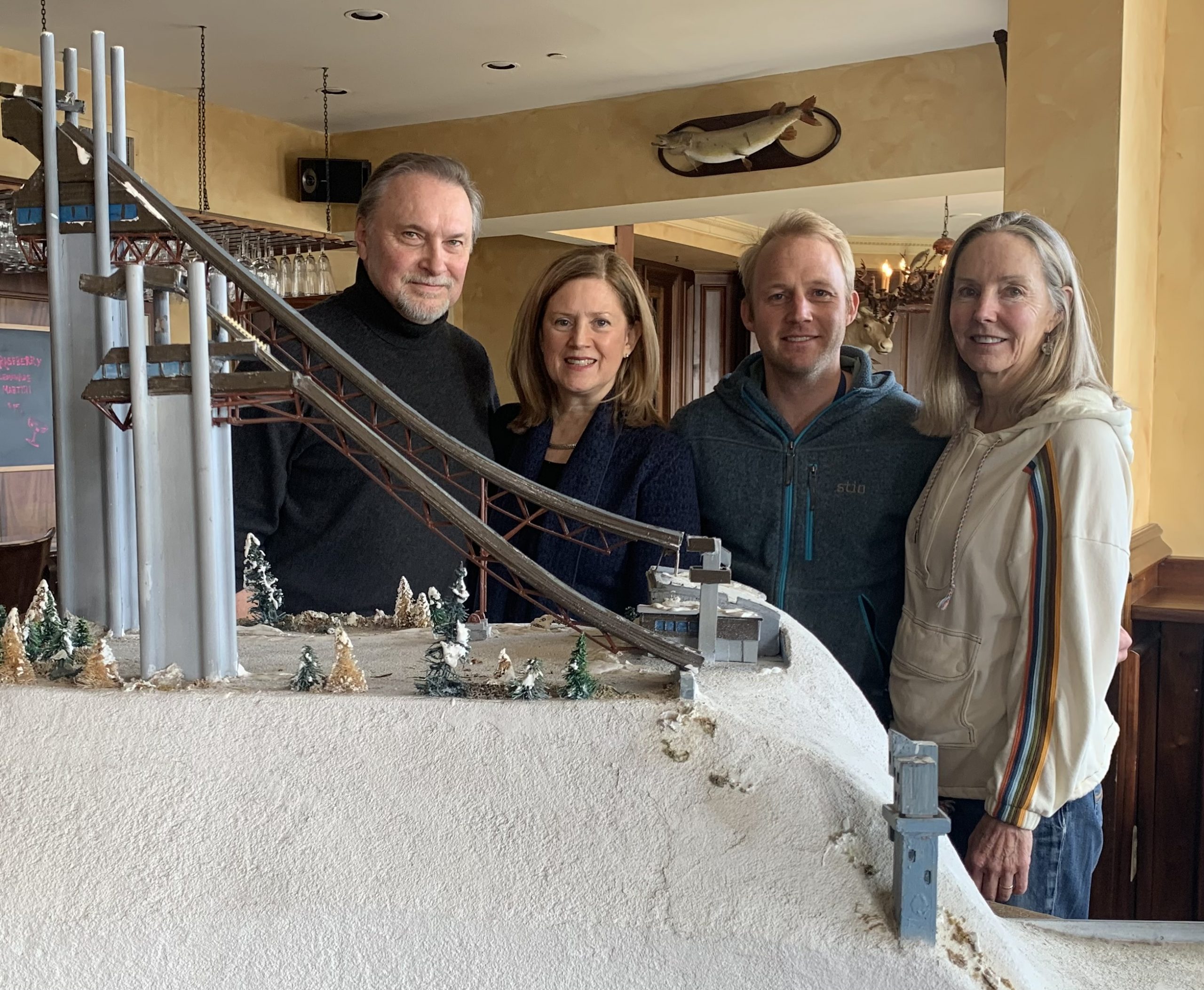 People posing with ski jump rendering