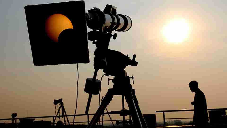Telescope capturing eclipse