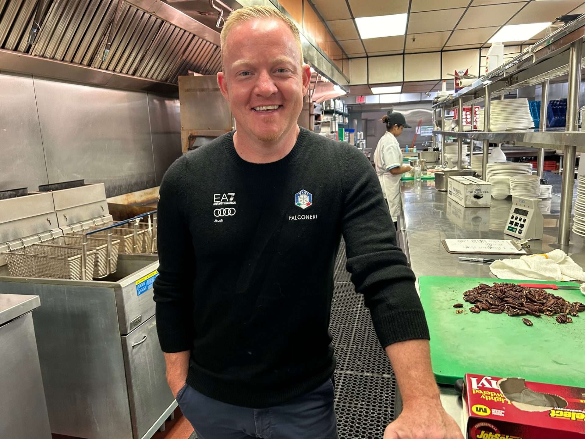 man standing in kitchen