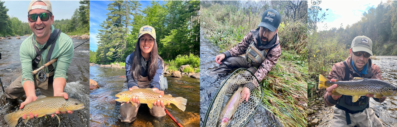 Multiple anglers holding fish.