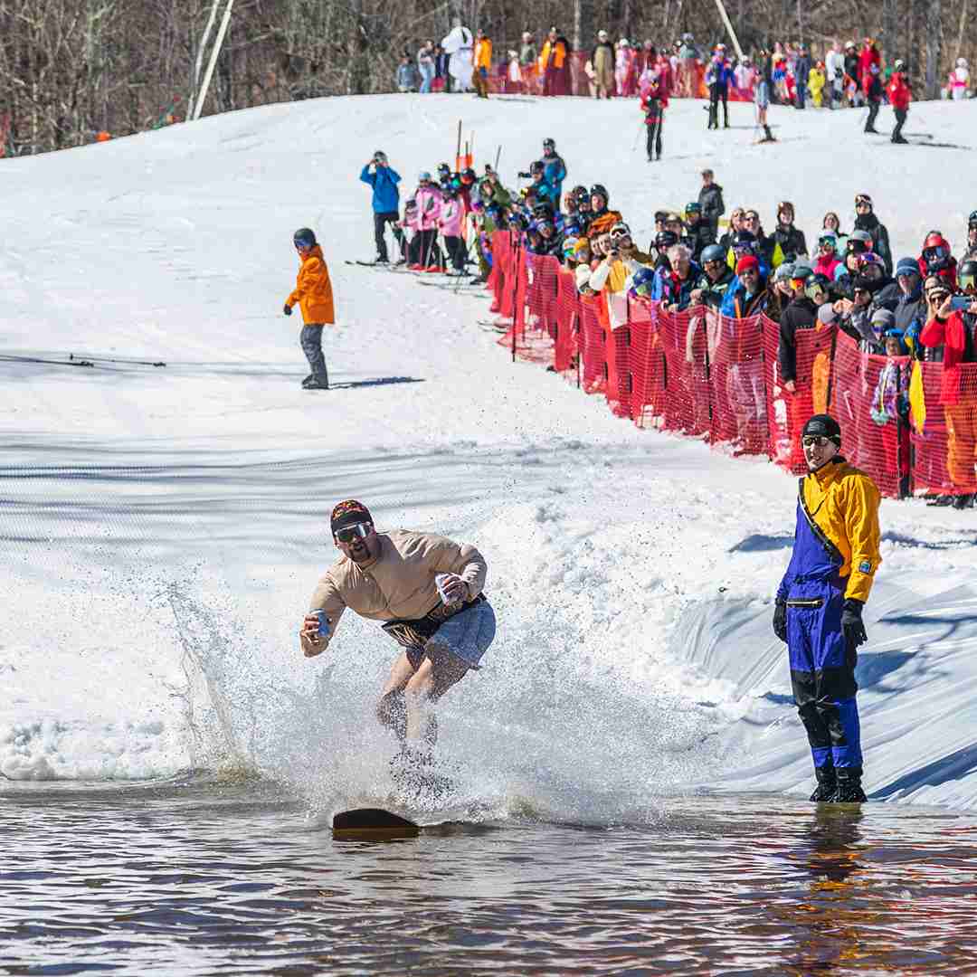 Guy in costume Pond skimming at Whiteface Mountain