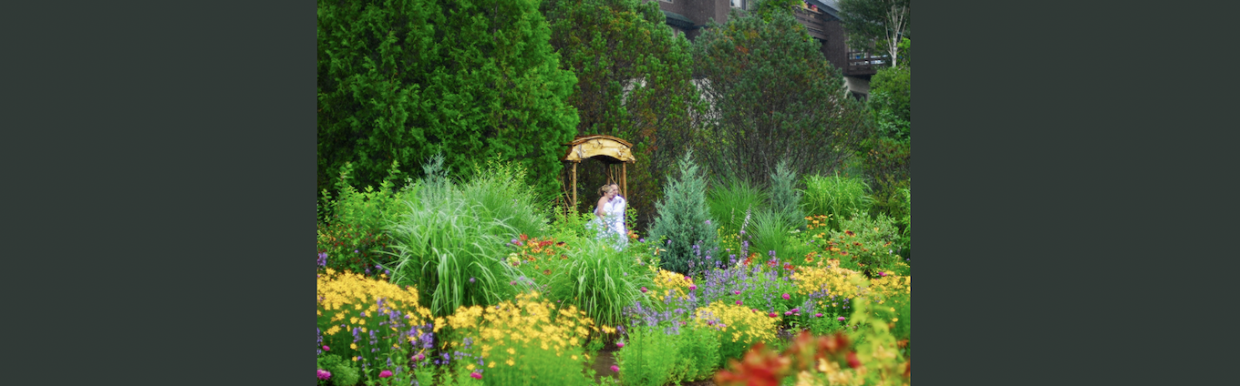 couple getting married in a garden