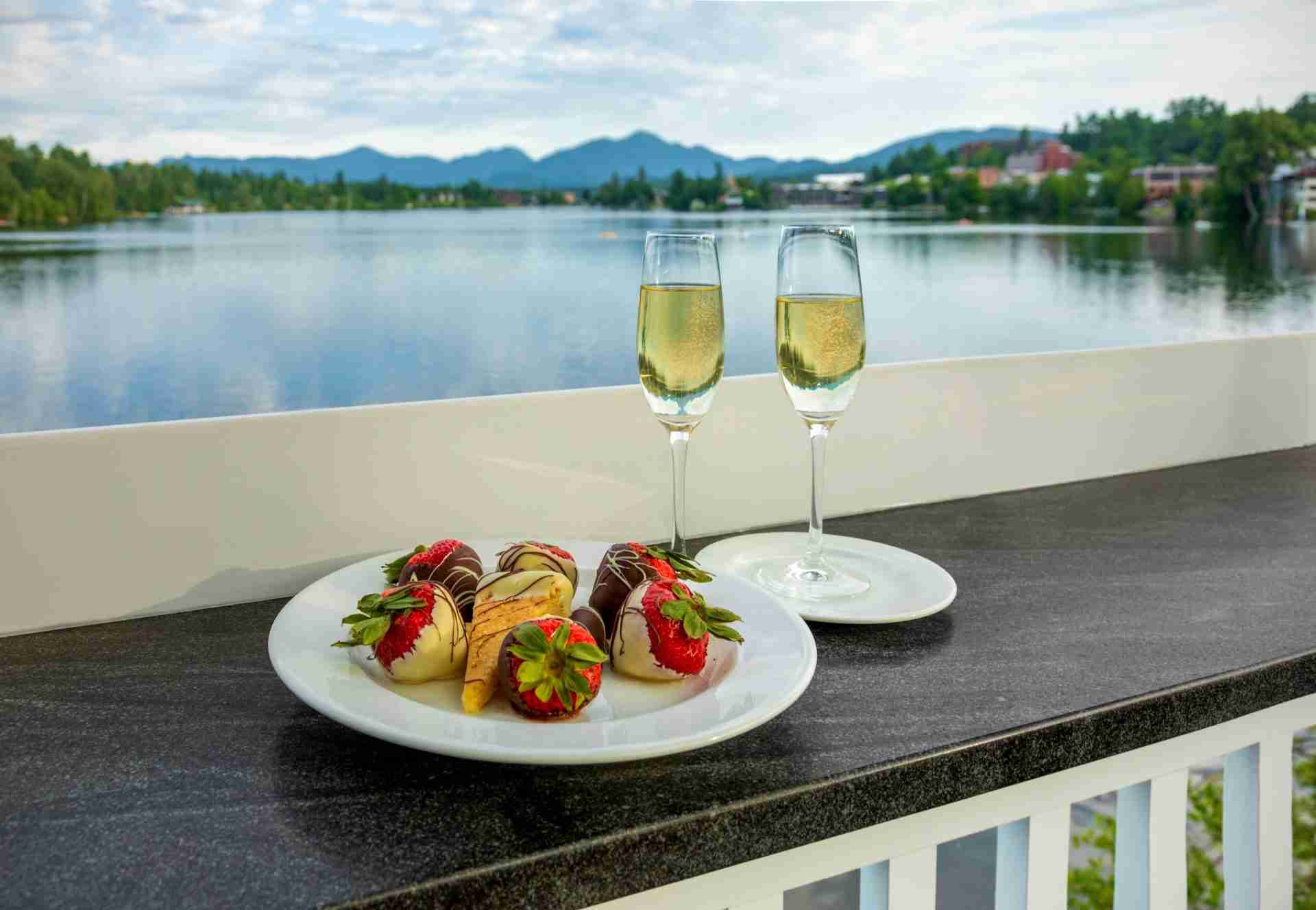 Champagne and strawberries by the lake