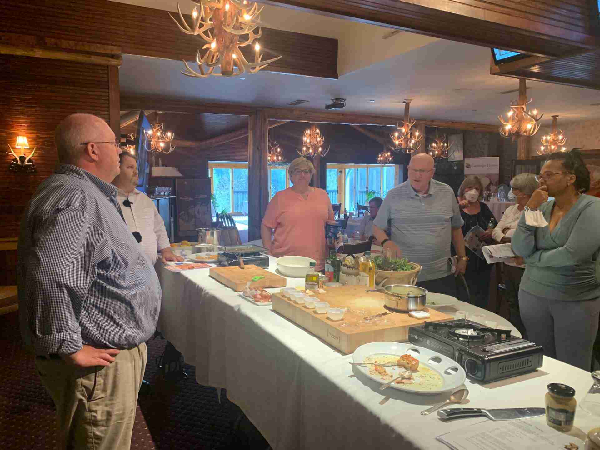 Guests talking to Chef Curtiss Hemm